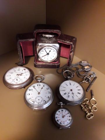Antique grandfather clock with visible mechanism - clock valuation
